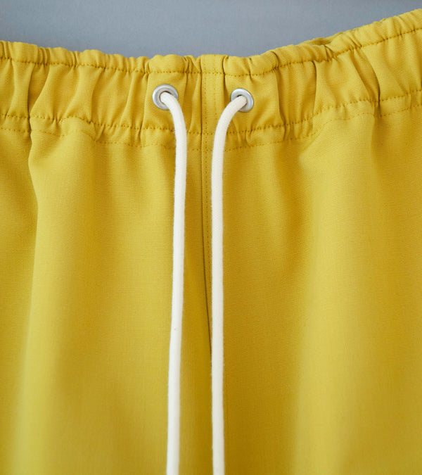 Auralee 'Wool Max Canvas Shorts' (Mustard Yellow)