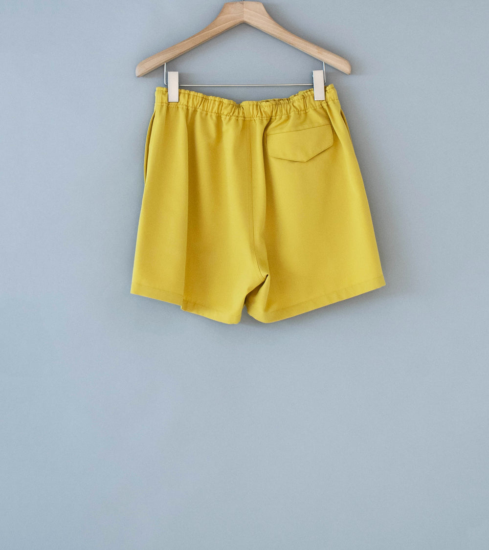 Auralee 'Wool Max Canvas Shorts' (Mustard Yellow)