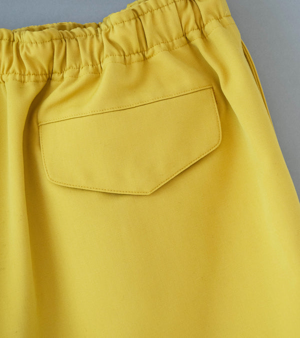 Auralee 'Wool Max Canvas Shorts' (Mustard Yellow)