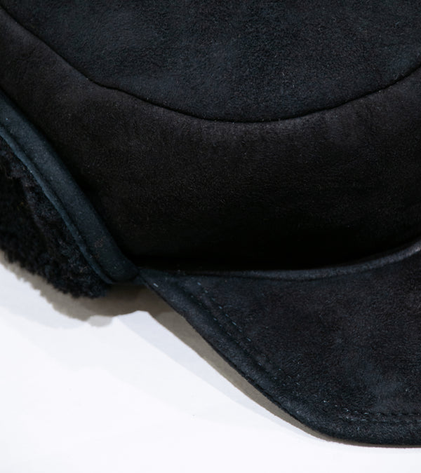Margaret Howell 'Press Stud Shearling Cap' (Black Curly Merino Shearling)