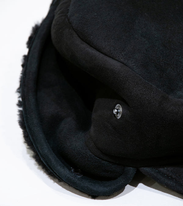 Margaret Howell 'Press Stud Shearling Cap' (Black Curly Merino Shearling)